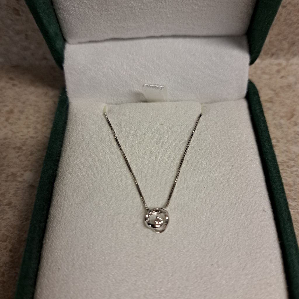 Silversterling Diamond Love Knot Necklace
